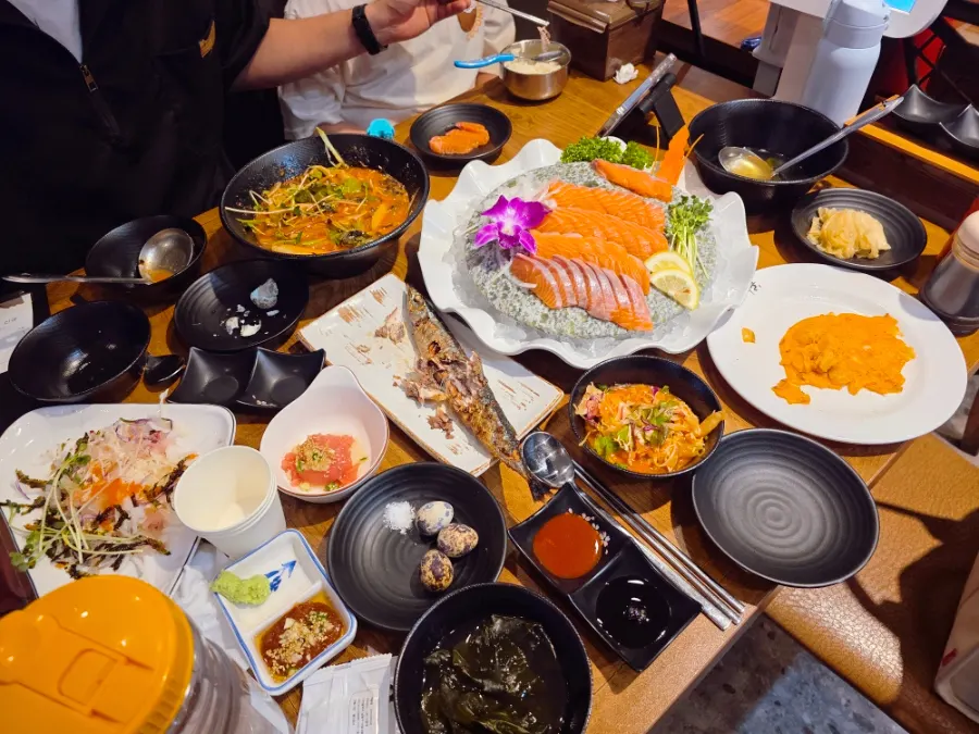 A dinner table full of food