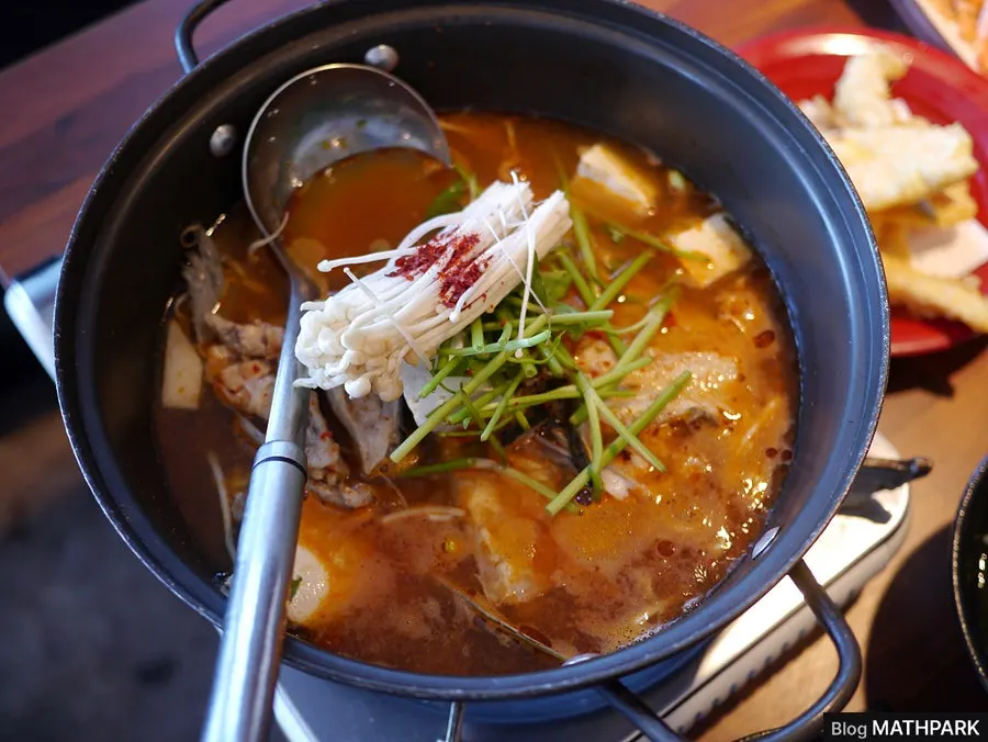 Kimchi pancake turning golden brown