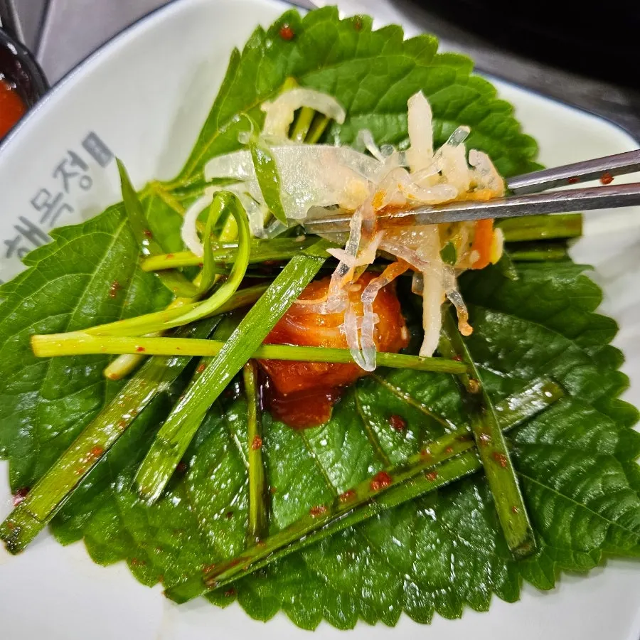 Boneless anglerfish on a perilla leaf