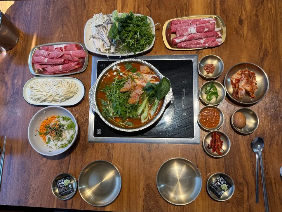 Pot of shabu-shabu broth starting to boil