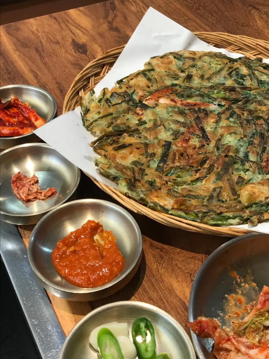 A full plate of shrimp-and-squid-loaded seafood pancake