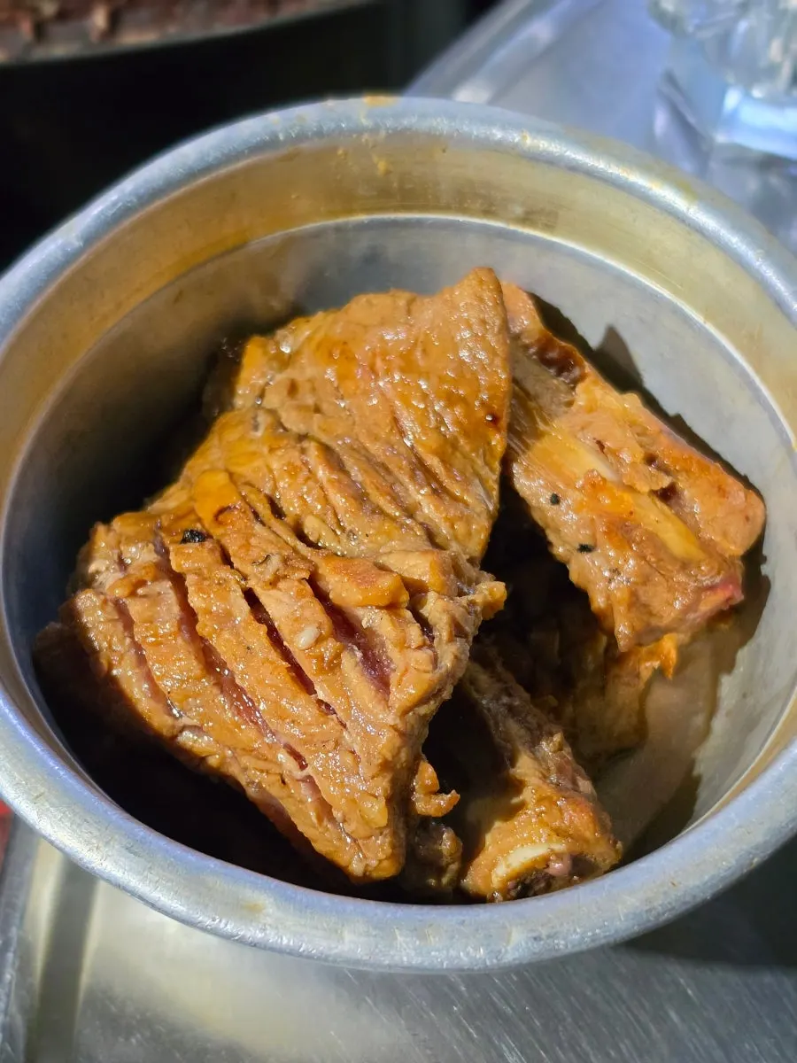 Grill plate placed over the charcoal at Yeontan Gongjang