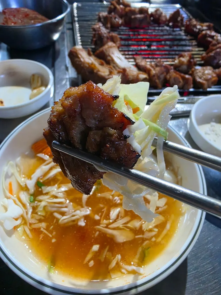 Score-cut pork king ribs with large rib bones