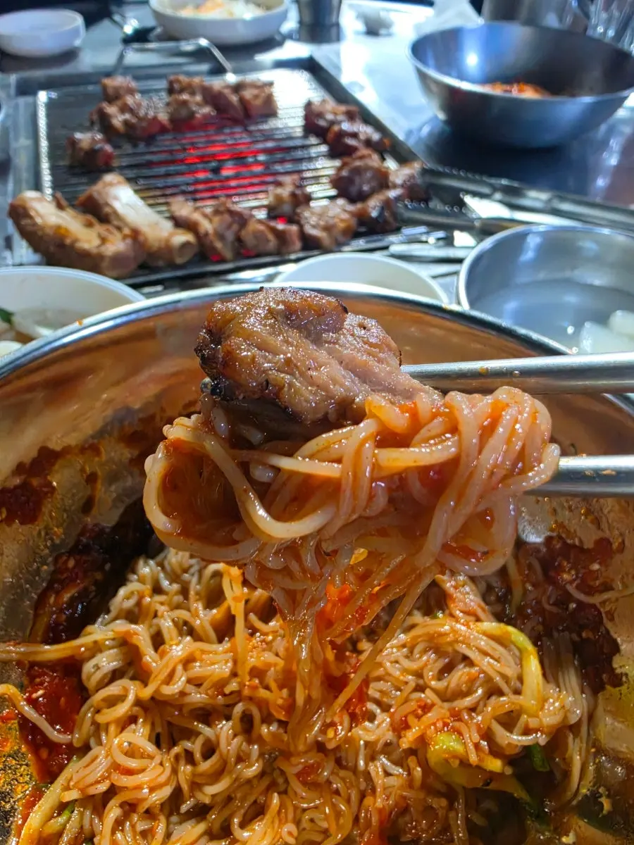 Pork king ribs served on pickled cabbage