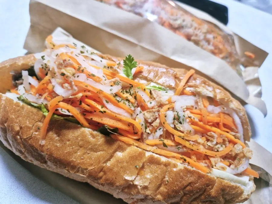 Cross-section of a bitten avocado banh mi