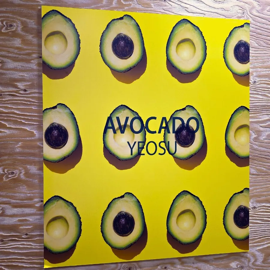 Rattan lamps and avocado plushie interior décor