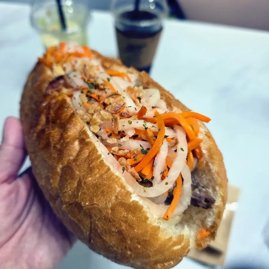 Banh mi with beef bulgogi and avocado slices