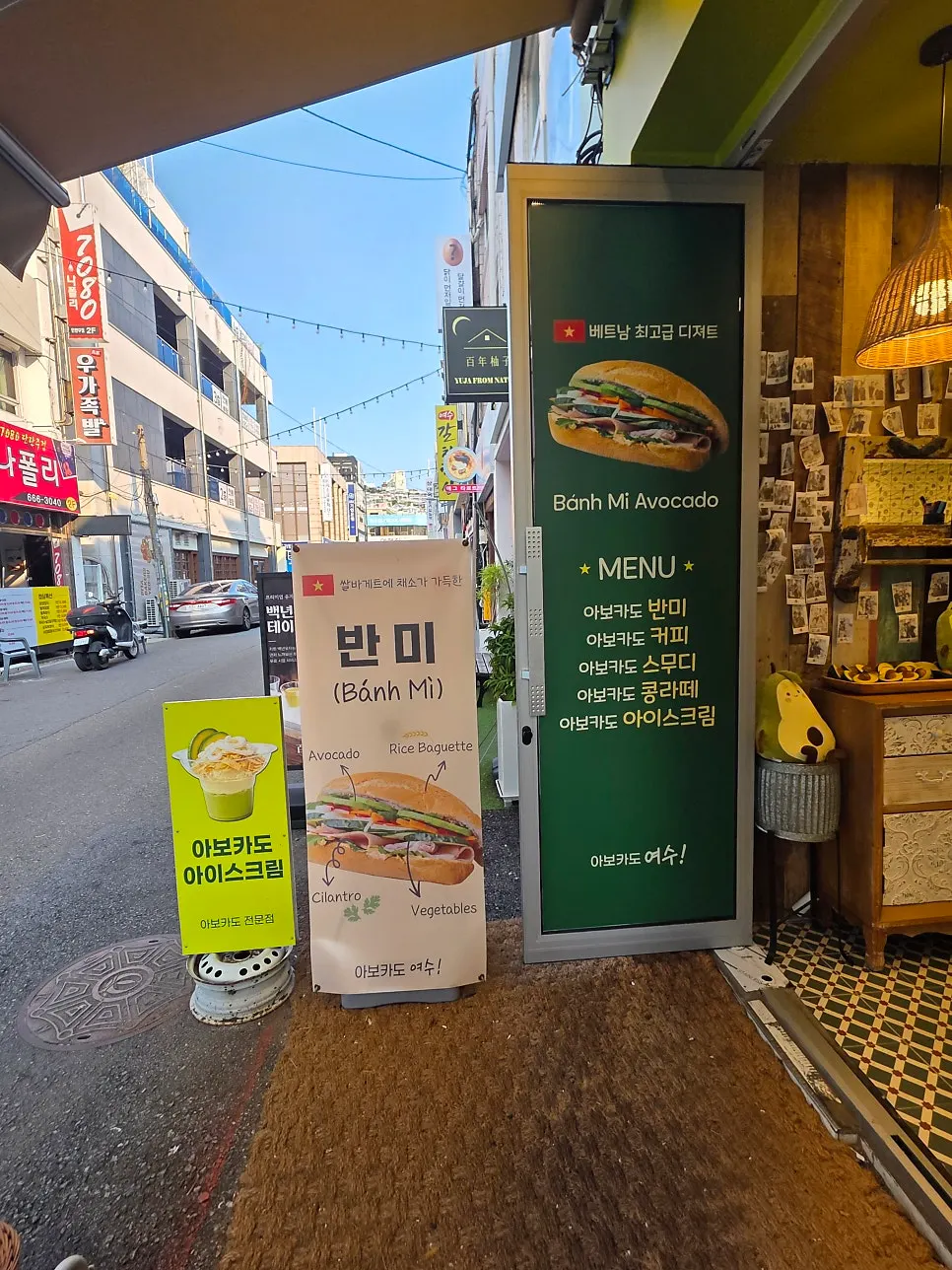 Café interior decorated with avocado-themed props