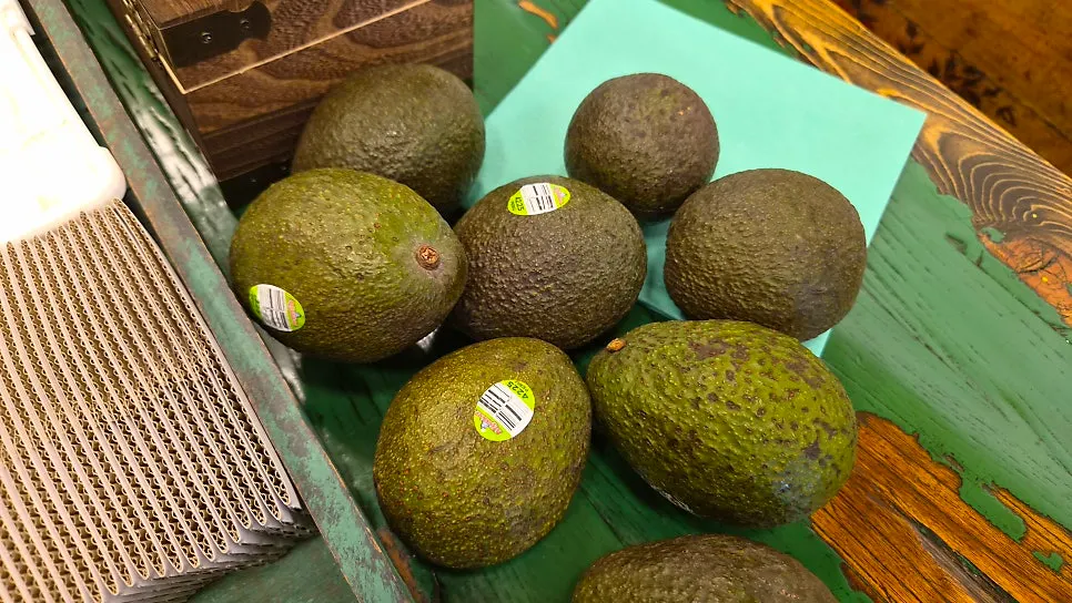 Menu showing prices for avocado smoothie and banh mi