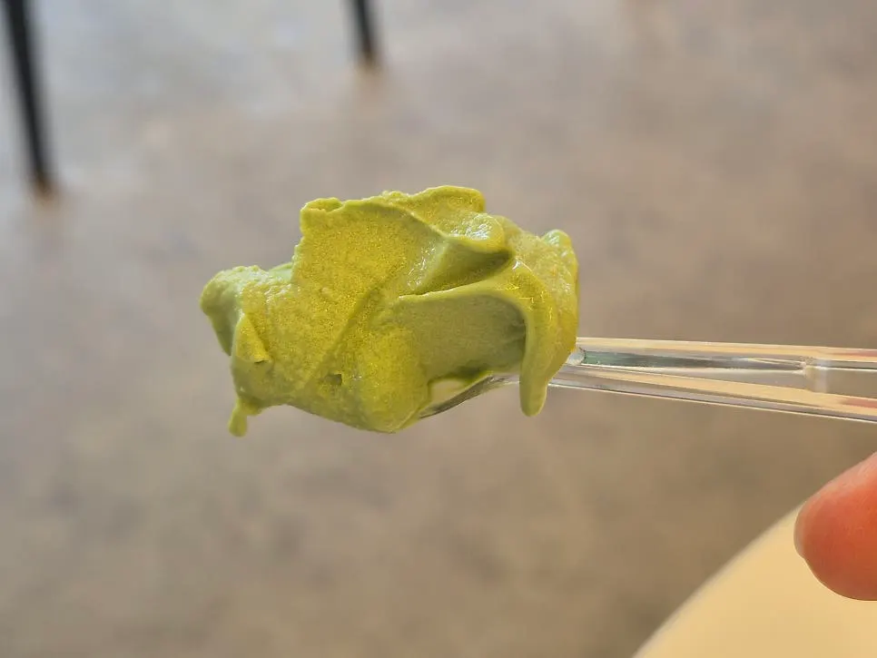 Mugwort ice cream served alongside the baguette