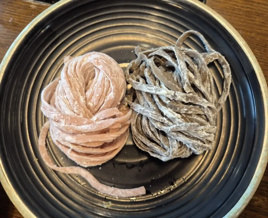 Kalguksu noodles added for the finish