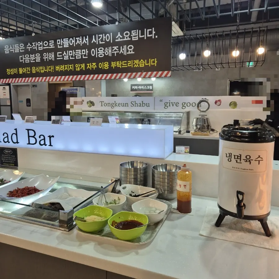 Self-serve bar with pizza and rice-porridge ingredients