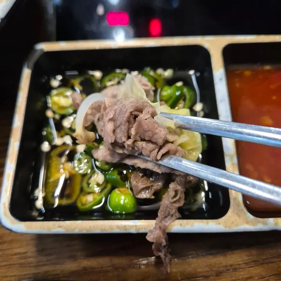 Shabu-shabu with vegetables and meat boiling