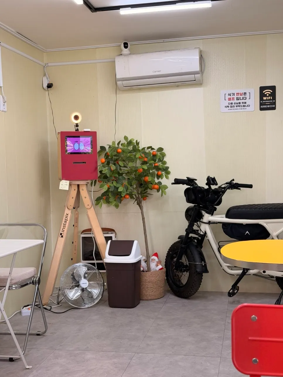 Indoor space with air conditioning and a fan