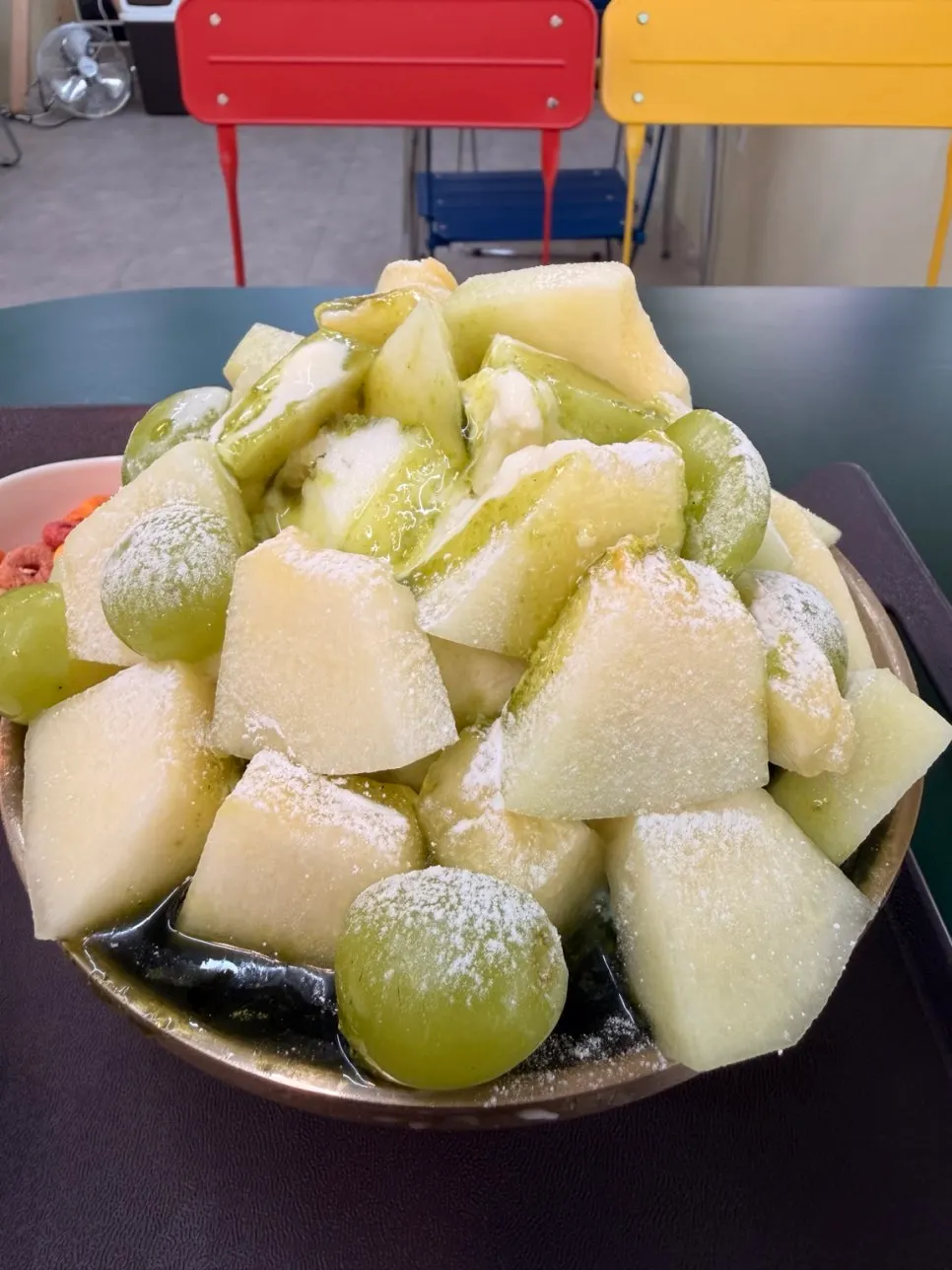 Thick-cut melon pieces and ice cream