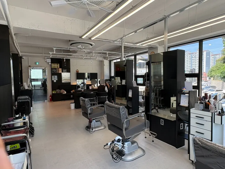 Salon interior with beauty training center plaques