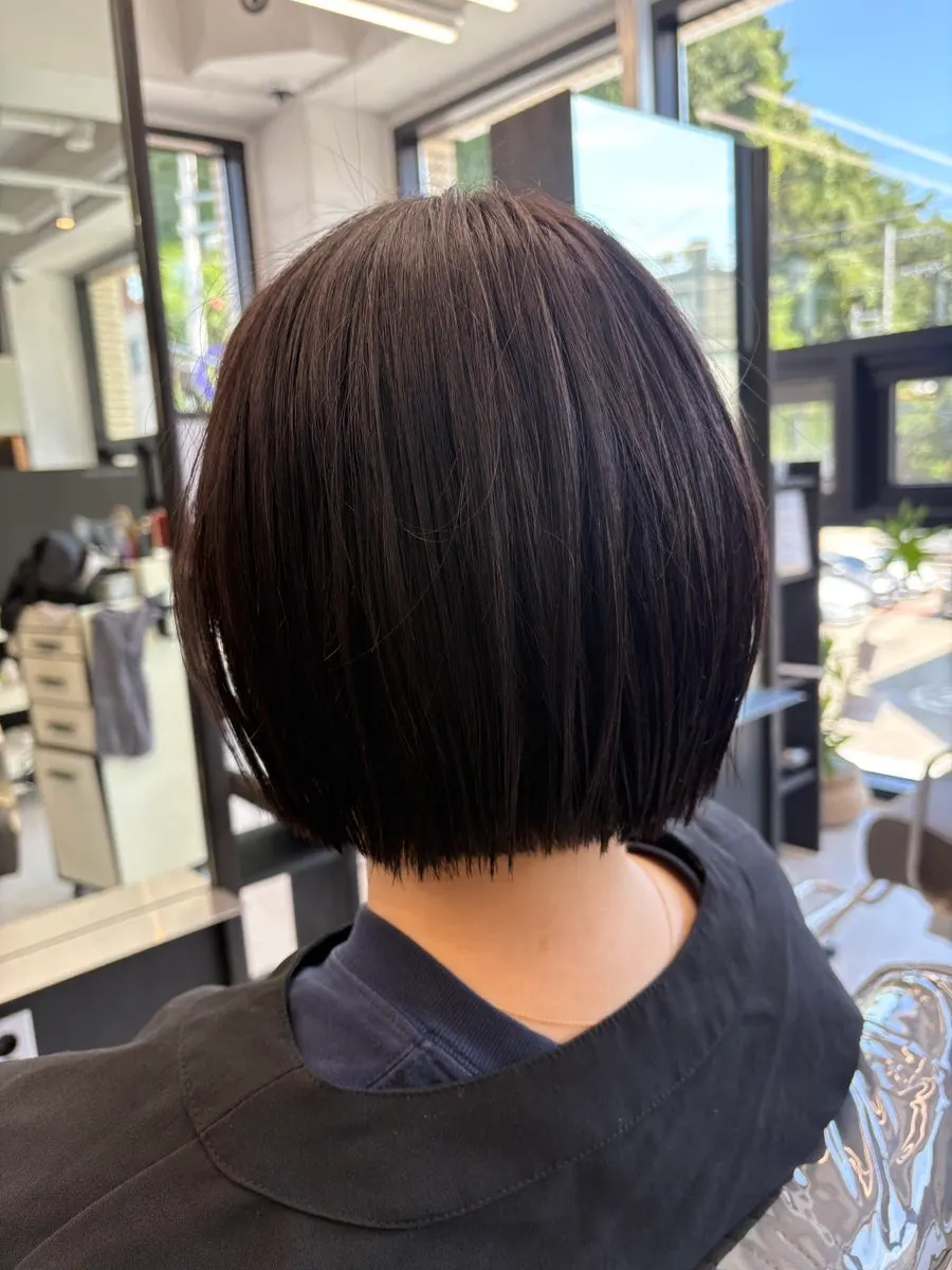 Hair being dried after coloring, showing the new shade