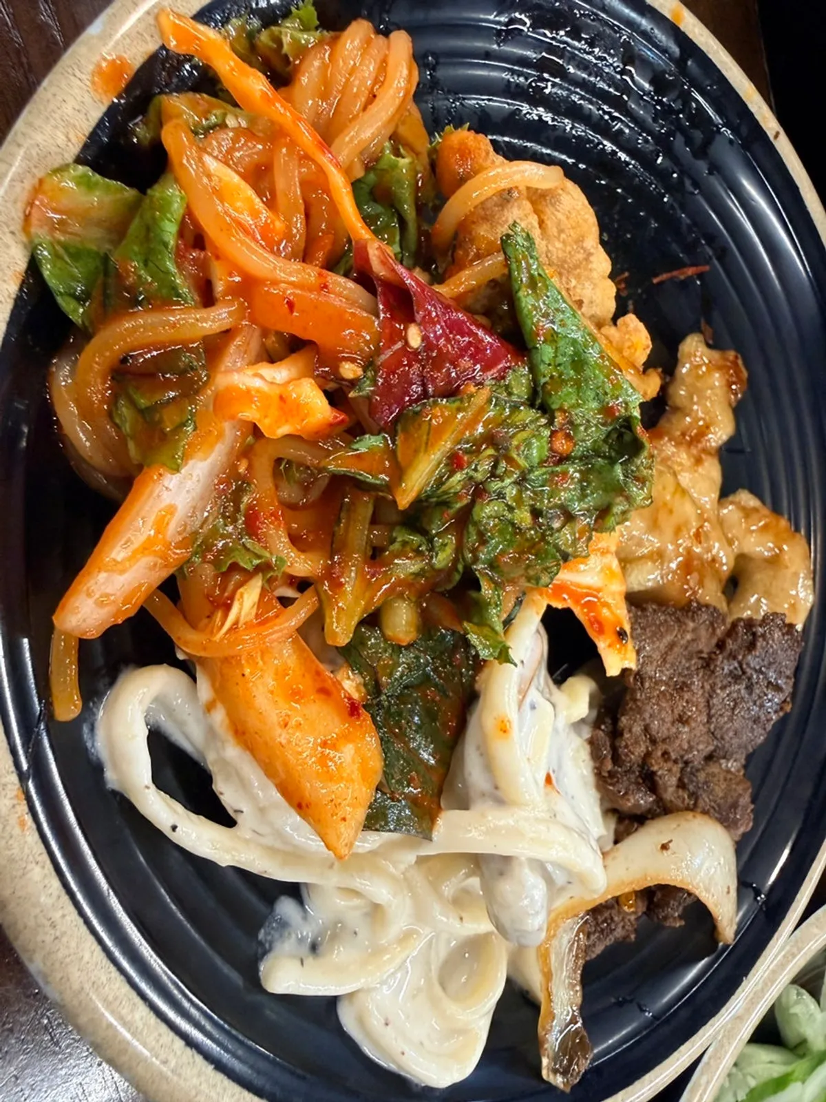 Jjolmyeon and side dishes from the Tongkeun Shabu salad bar