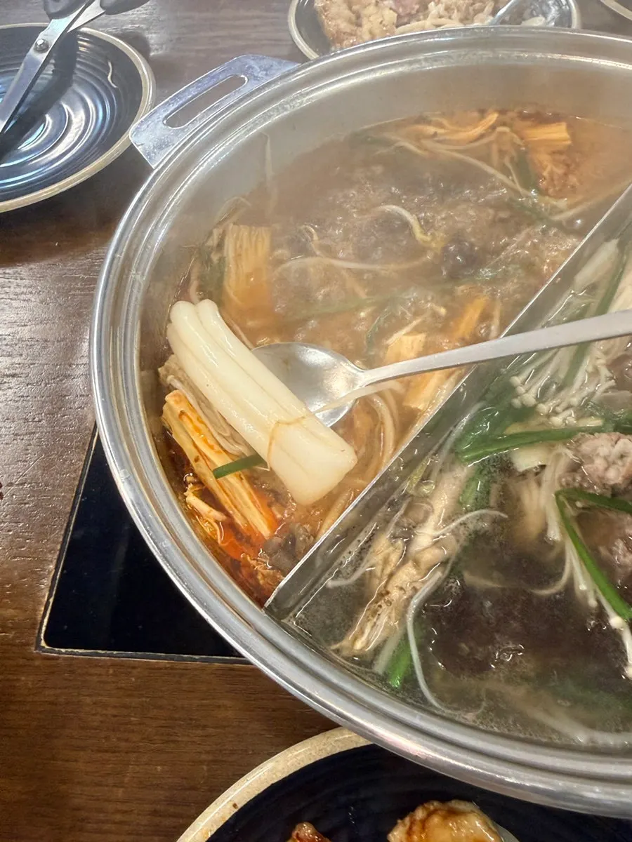 An assortment of shabu-shabu vegetables and mushrooms
