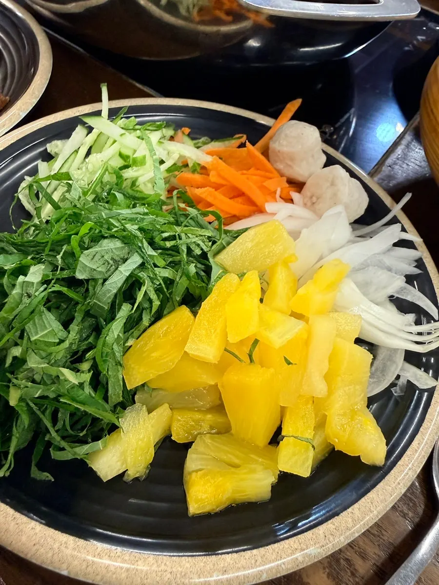 A plate combining Korean, Chinese, and Western dishes
