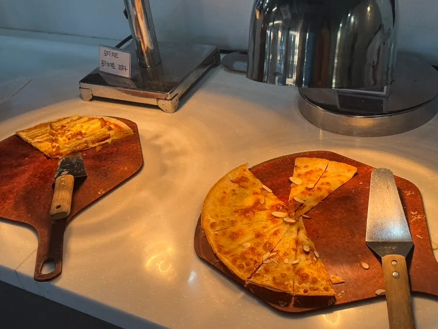 Pizza and salad at the self-bar corner