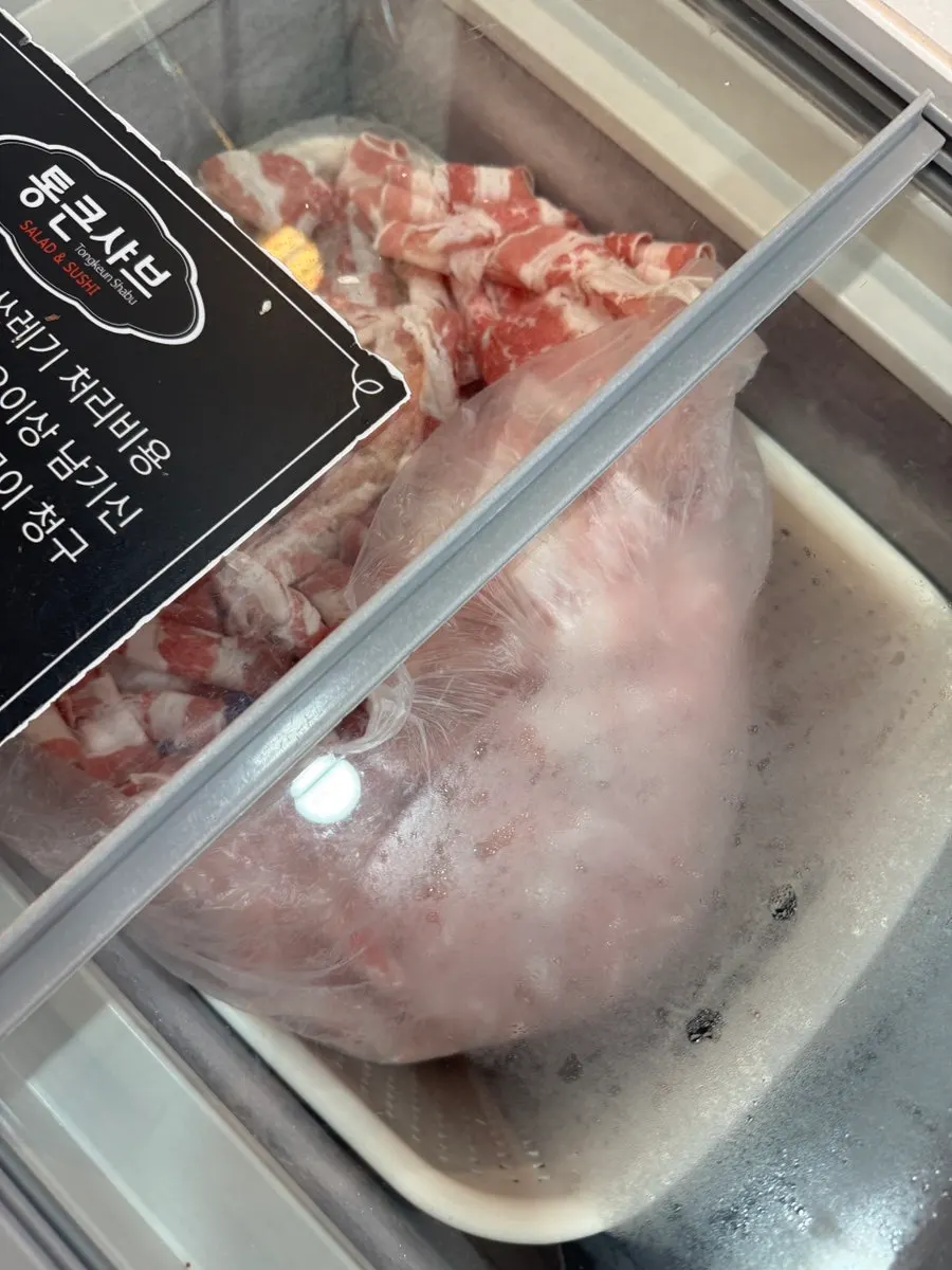 Shabu-shabu meat section split into pork neck and beef brisket