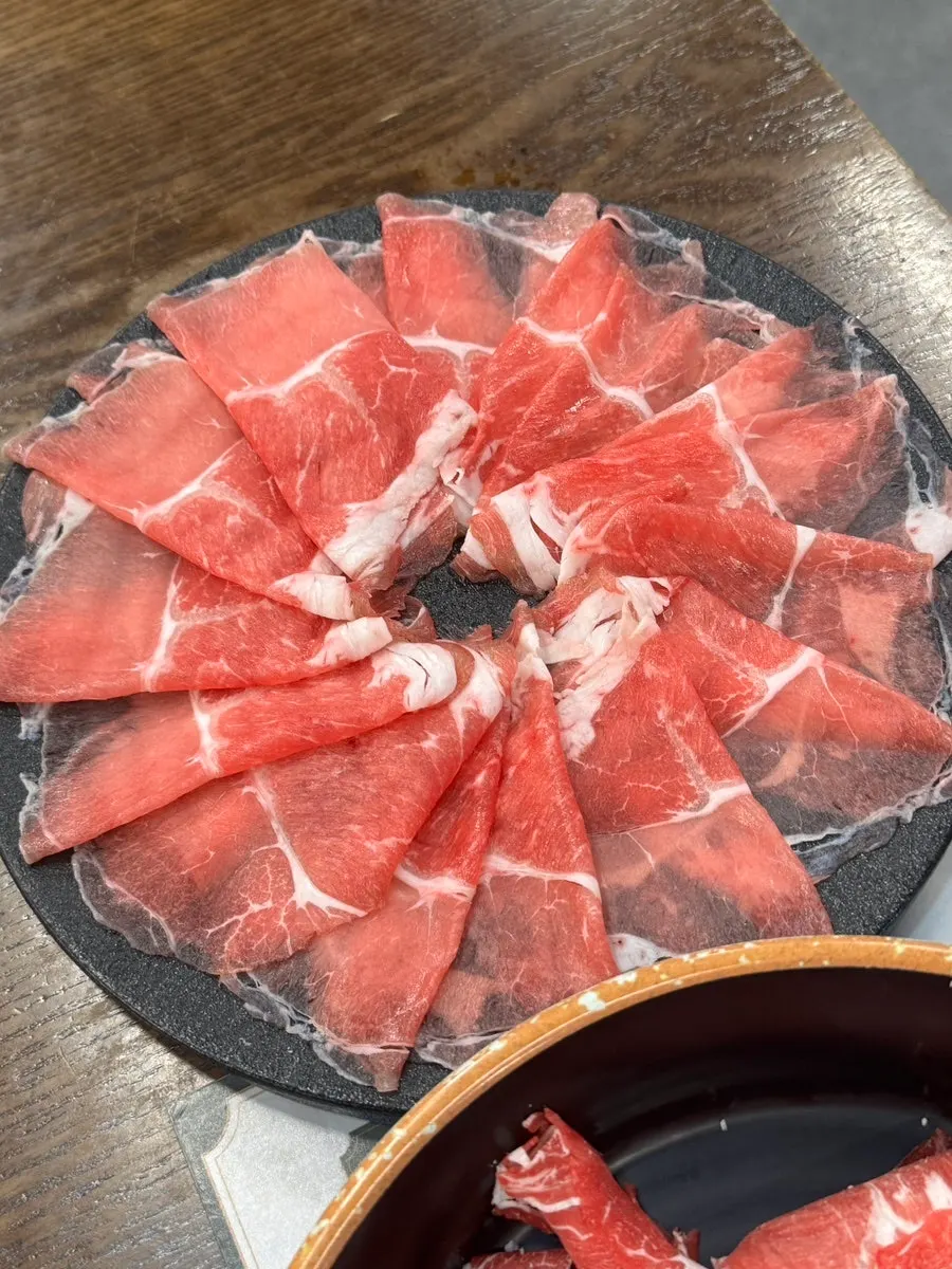 Pork neck cooked in the shabu-shabu broth