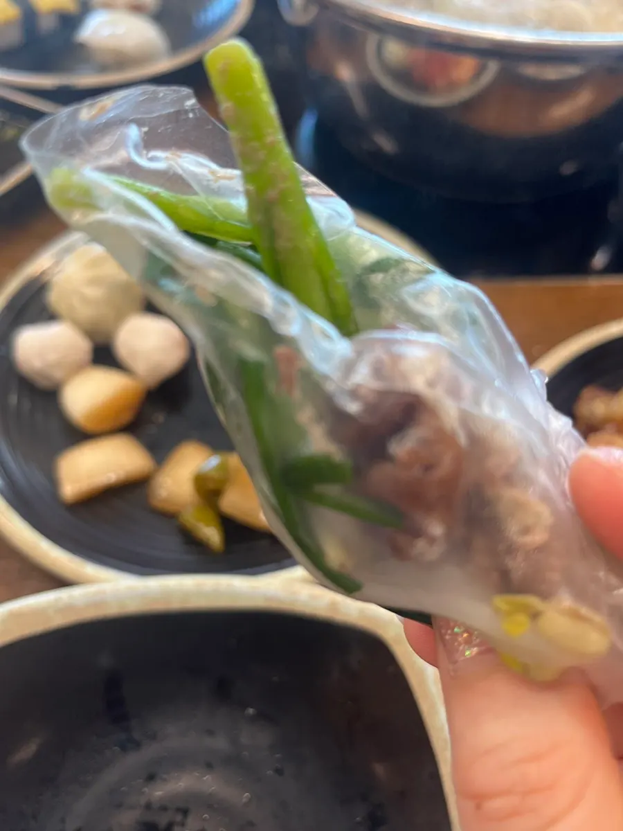 Rice paper wrap filled with vegetables and meat