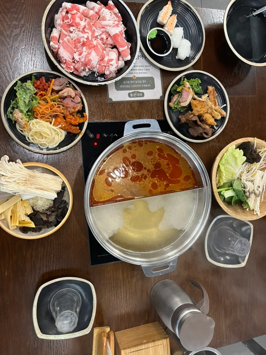 육수에 담가 익힌 소고기 한 점