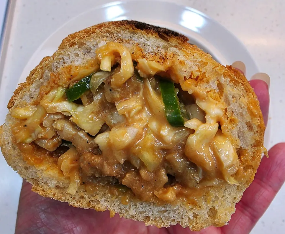Eating the baguette burger after it's gone cold
