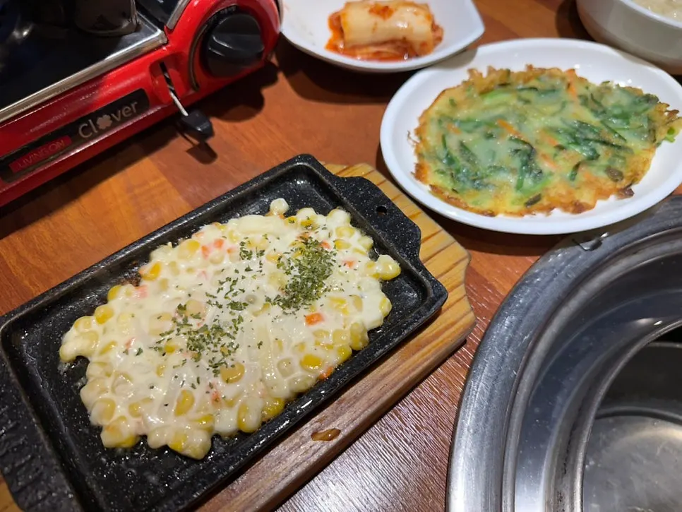A plate of side dishes served with the meat