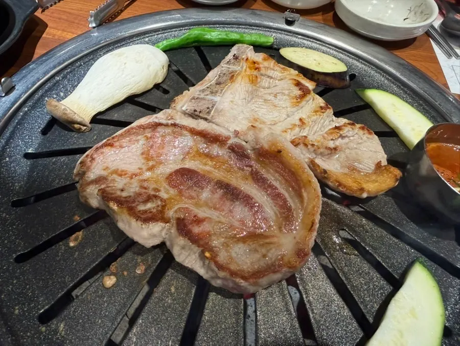 Bright red raw pork combo on a plate