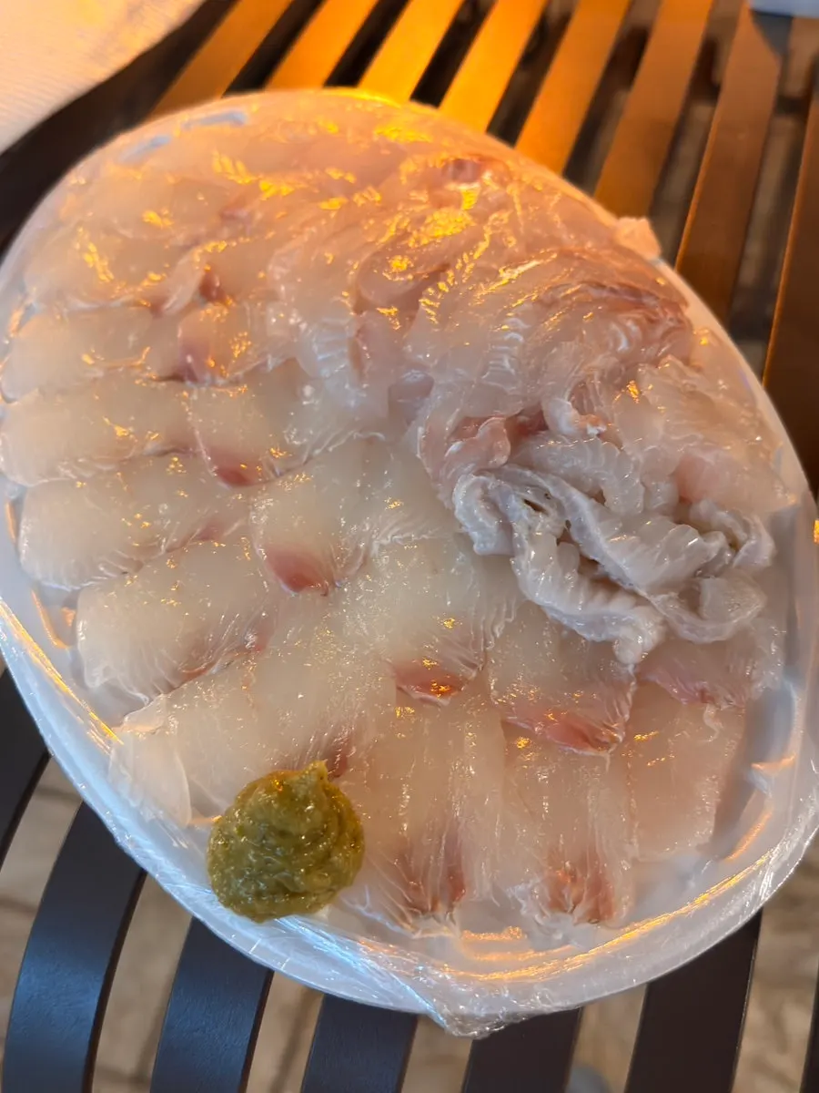 Flounder sashimi being prepped right in front of the customer