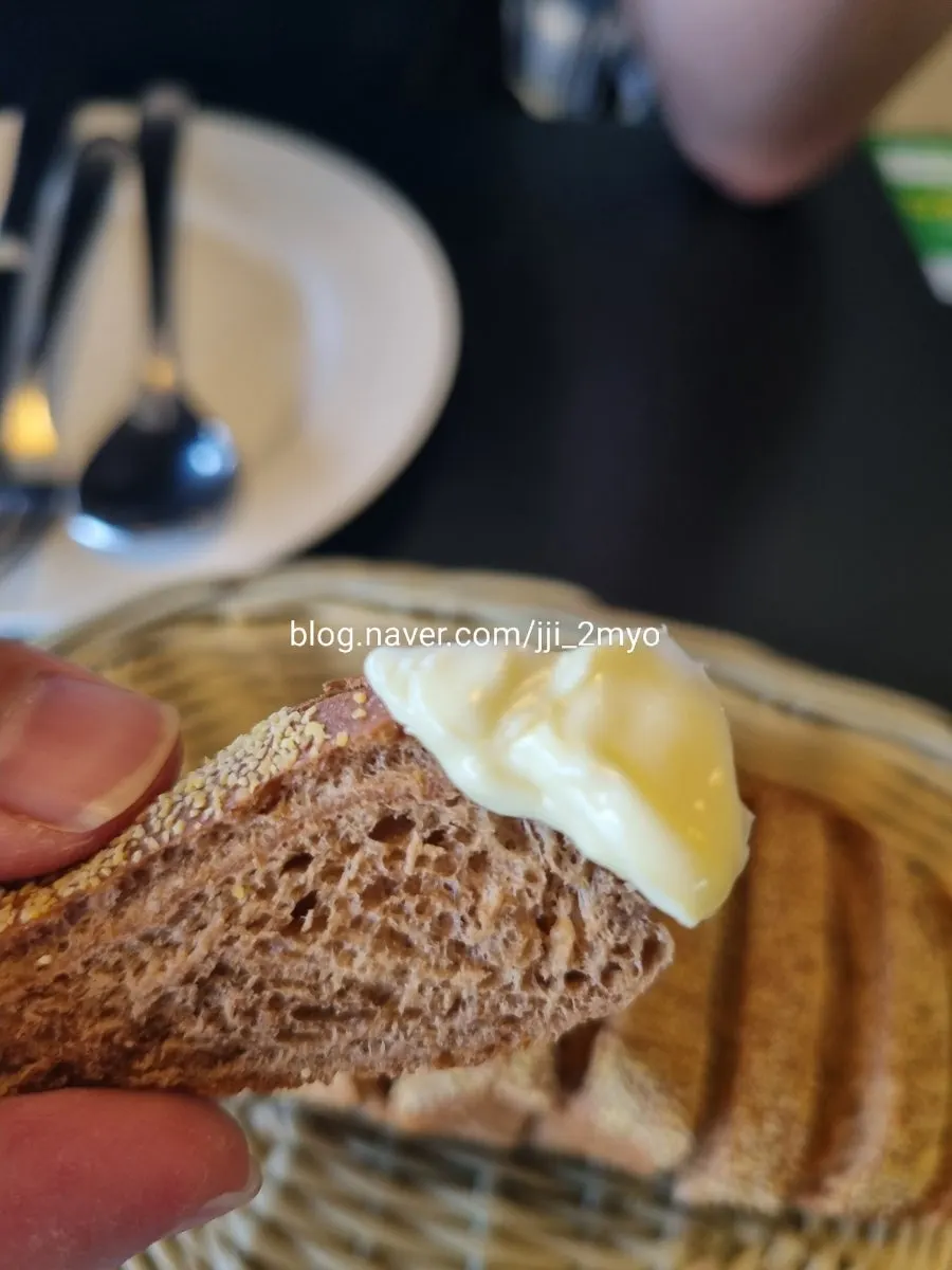 Butter spread on the starter bread