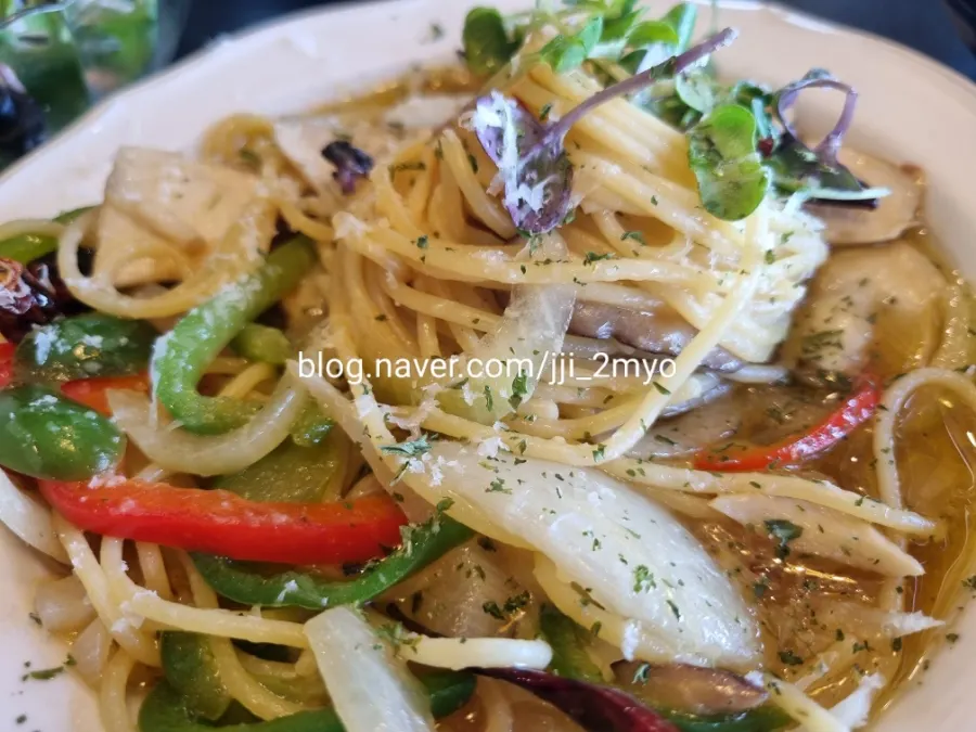 Truffle oil pasta topped with plenty of mushrooms