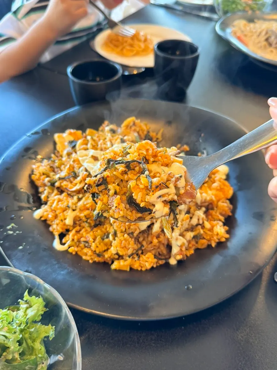 A spoonful of gat kimchi pilaf