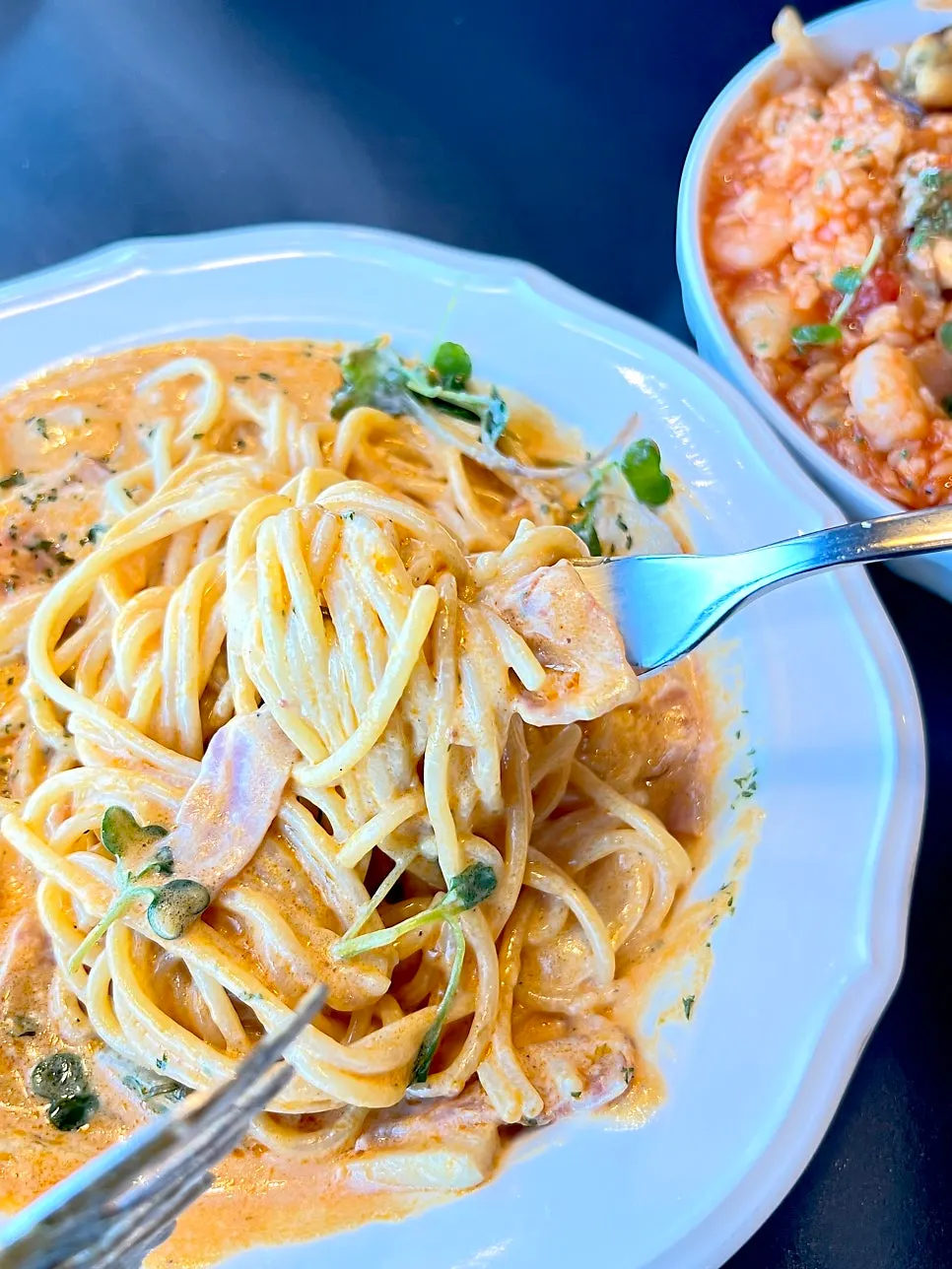 Thick cream pasta twirled around a fork