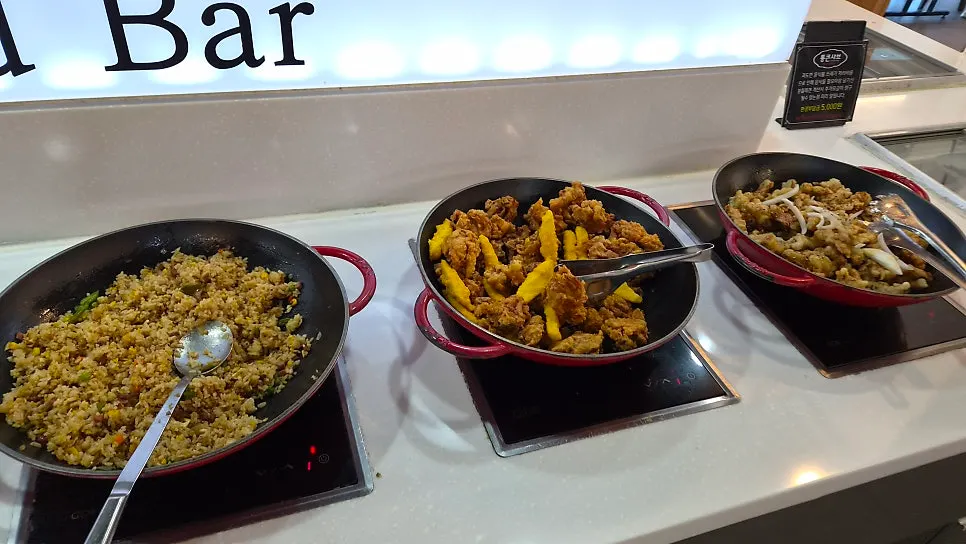 Warming station with sweet and sour pork and fried rice