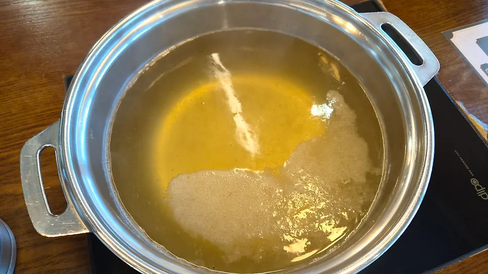 Basic broth pot coming to a boil