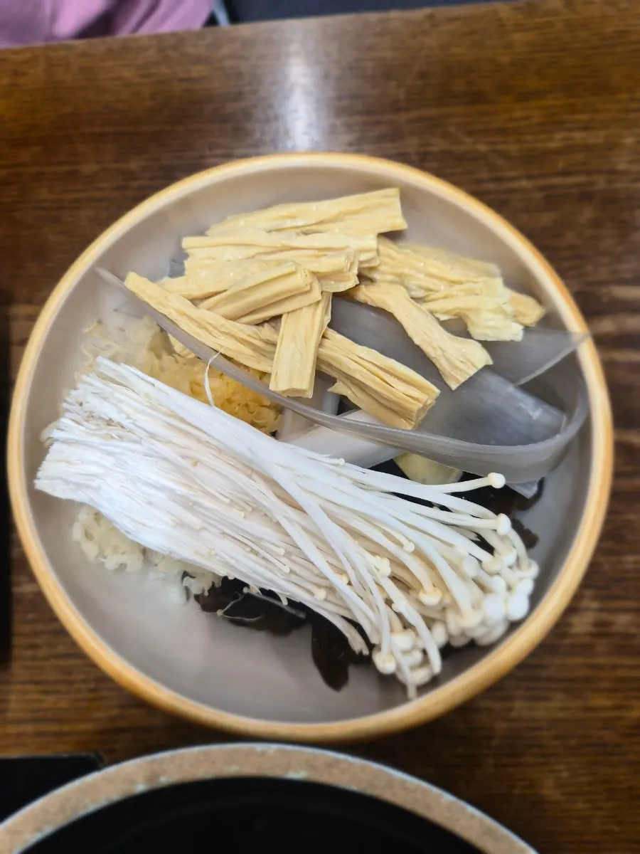 Fuzhu and Chinese glass noodles served with the mala broth