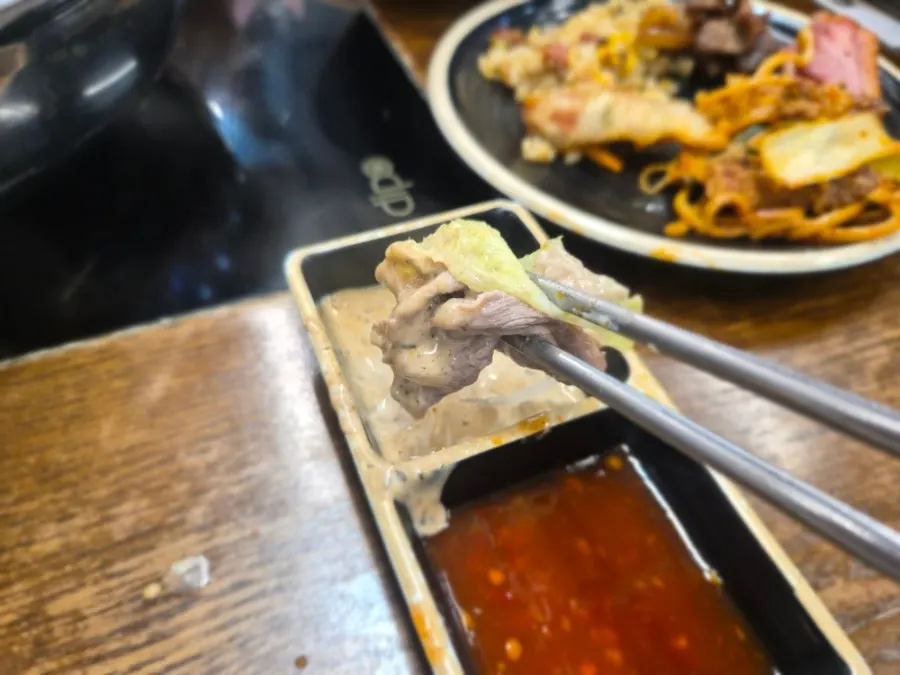 Full shabu-shabu spread with sauces