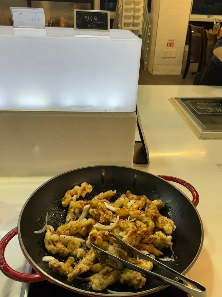 Hot food corner with smoked duck and spicy chicken feet