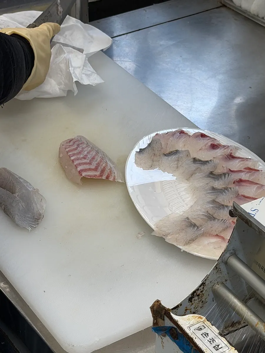 The owner filleting the fish