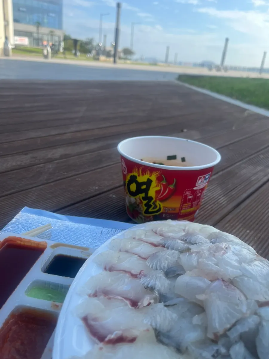 Close-up of a thickly sliced piece of sashimi