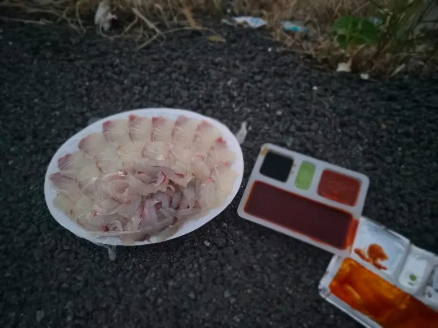 Red sea bream sashimi spread laid out by the sea