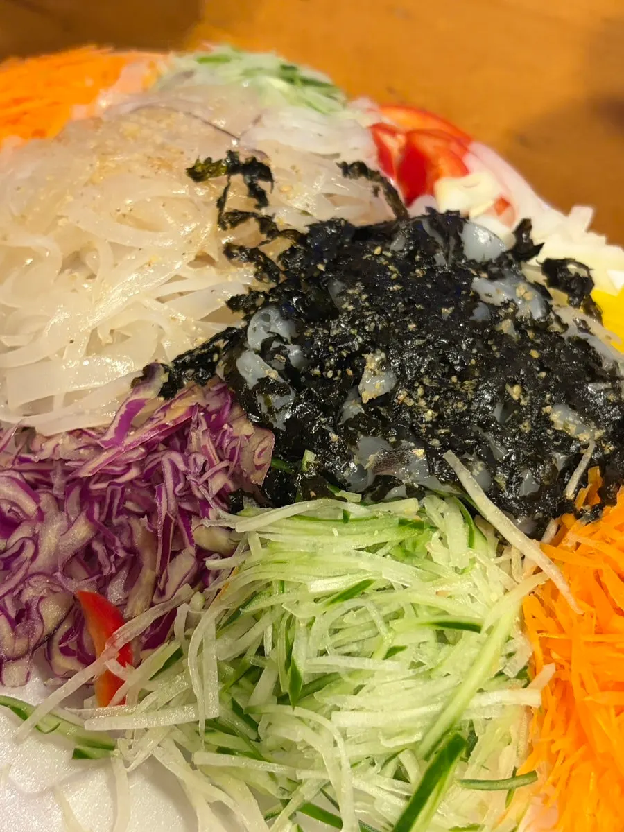 Live squid sashimi plated after opening the package