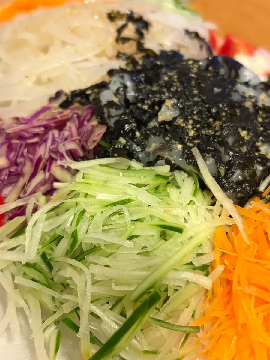 Close-up of the chewy live squid sashimi