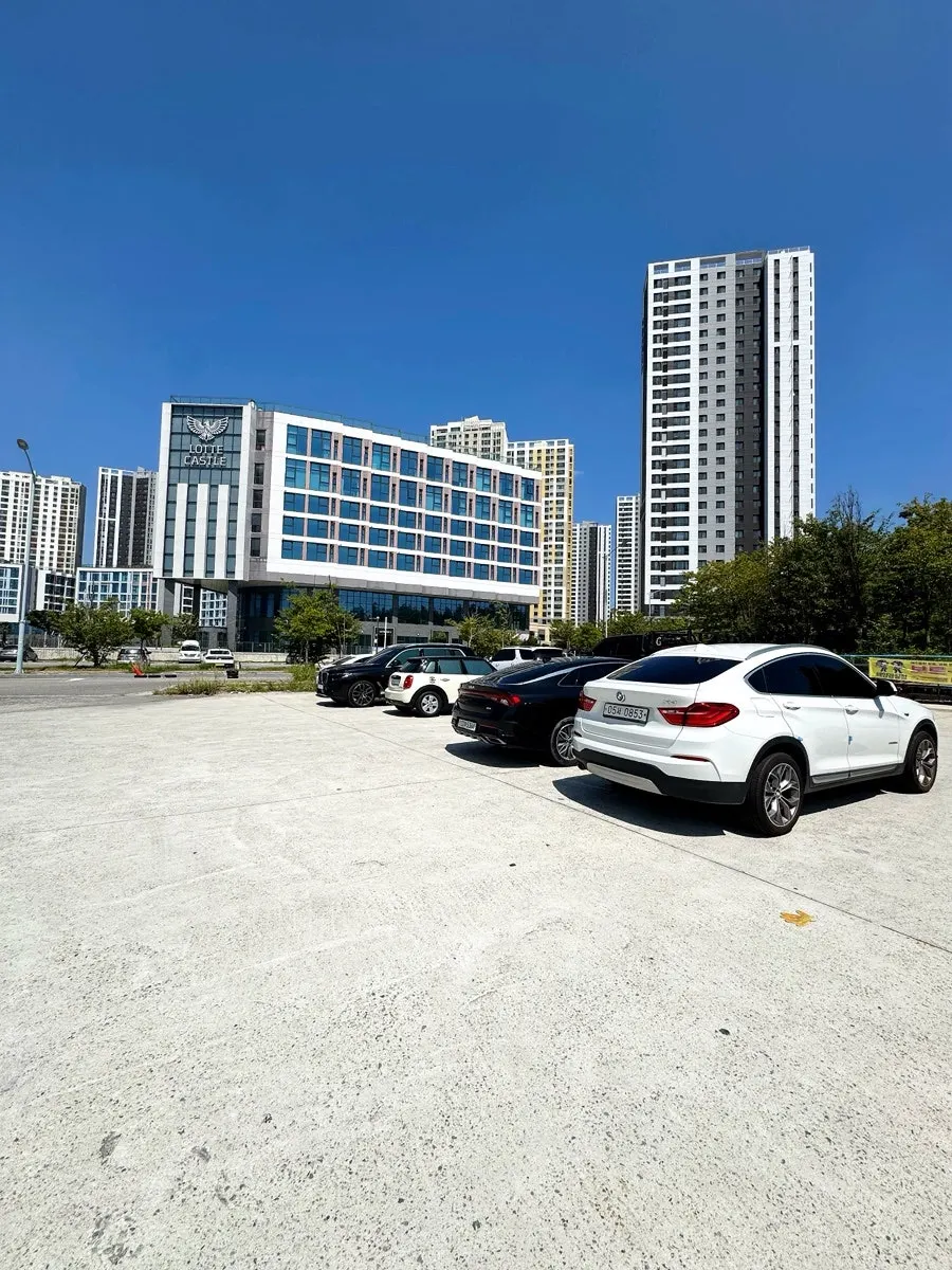 Large open parking lot near the sashimi takeout shop