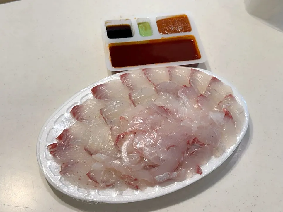 Pet dog excited by the smell of sashimi