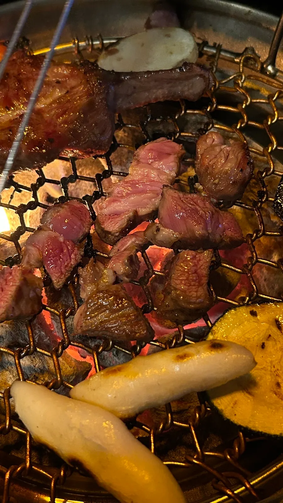 A piece of lamb paired with a drink